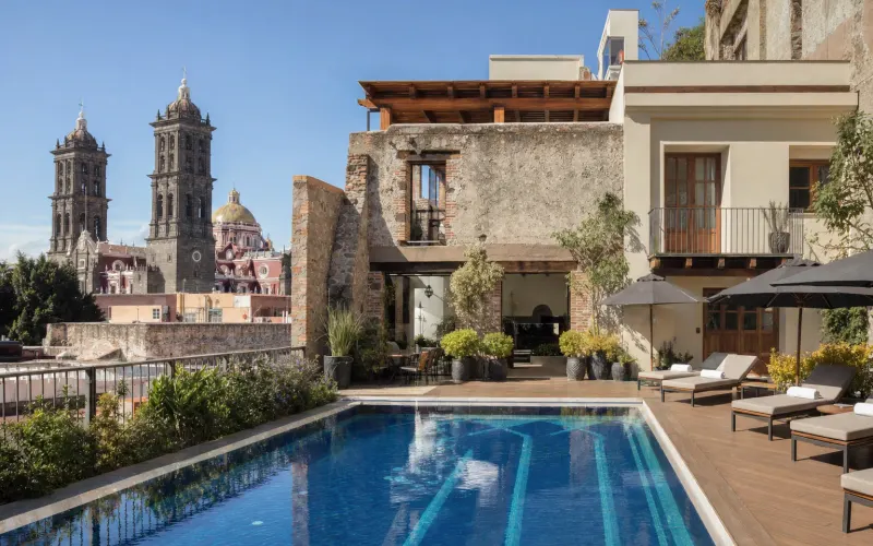 AI-generated realistic daylight view of Cartesiano Boutique & Wellness Hotel in Puebla, Mexico