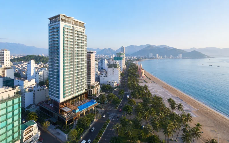 AI-generated beachfront high-rise hotel scene inspired by Havana Nha Trang Hotel in Vietnam