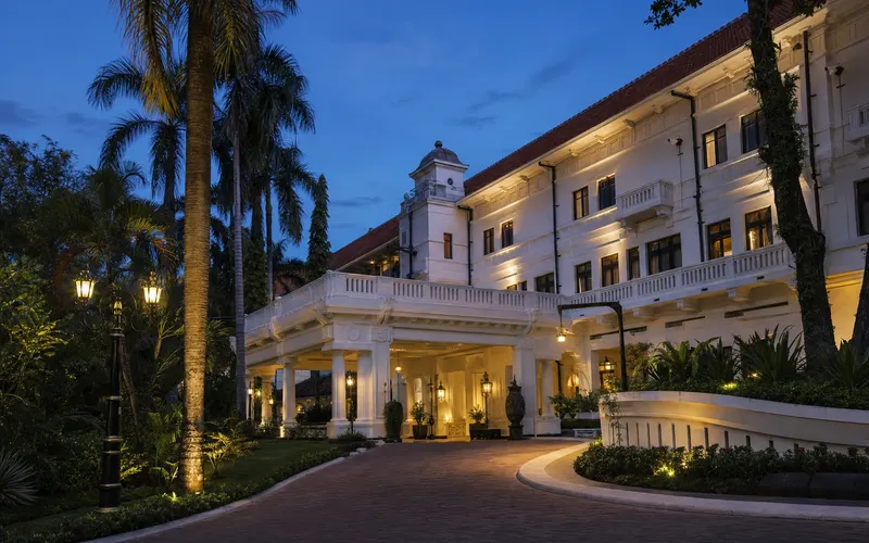 AI-generated editorial dusk view of Hotel Majapahit Surabaya - MGallery in Surabaya, Indonesia
