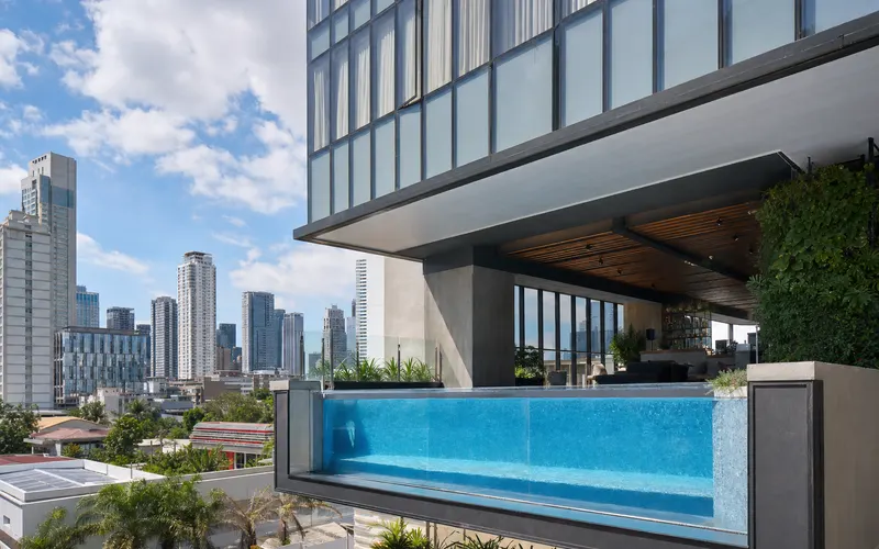 AI-generated realistic daylight view of I'M Hotel in Makati, Philippines