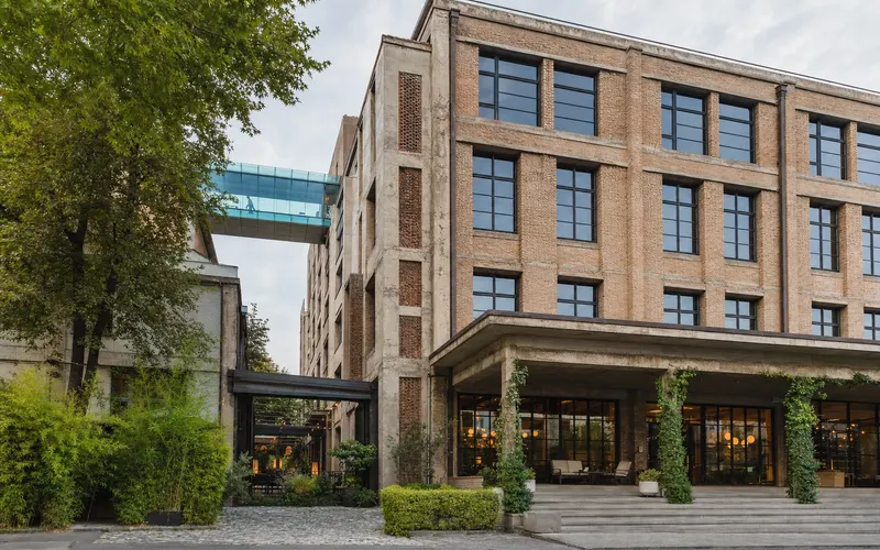 AI-generated realistic daylight view of Stamba Hotel in Tbilisi, Georgia